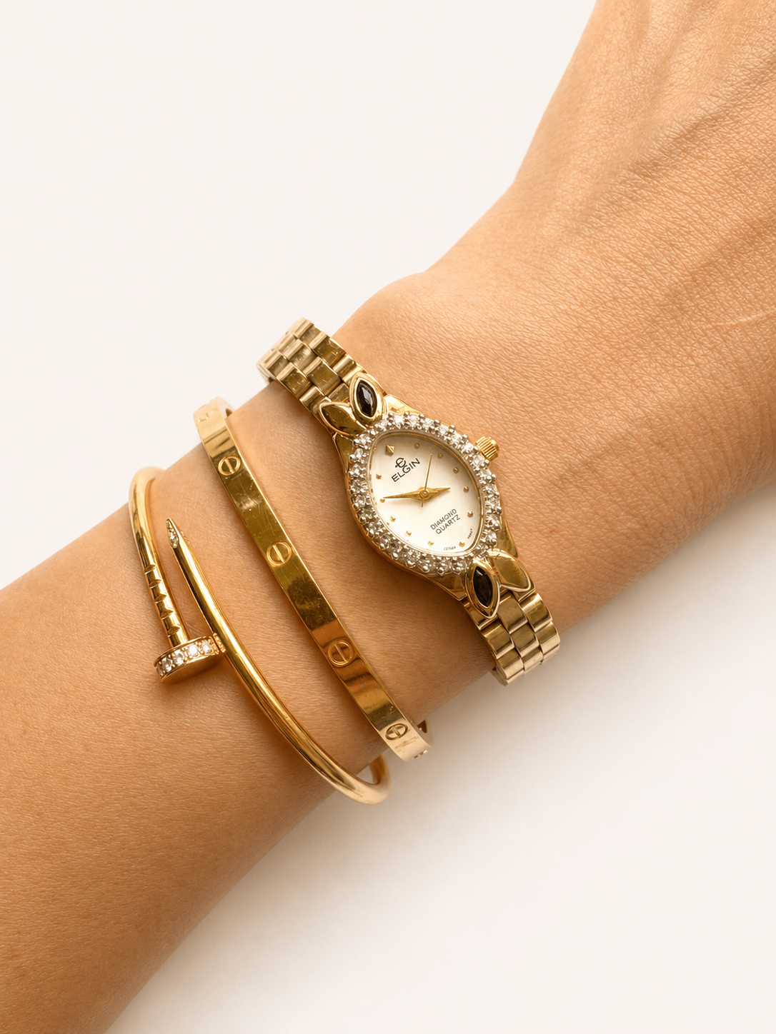 ELGIN "The Heiress" 1990s Diamond-Accented Onyx Marquise Oval Ladies Quartz Gold-tone Watch