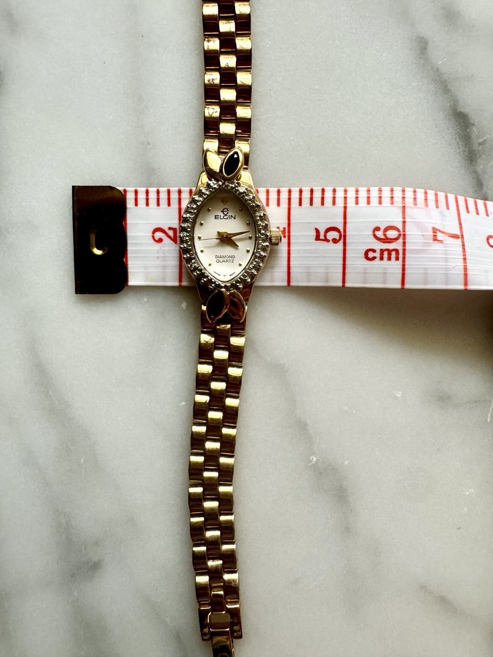 ELGIN "The Heiress" 1990s Diamond-Accented Onyx Marquise Oval Ladies Quartz Gold-tone Watch
