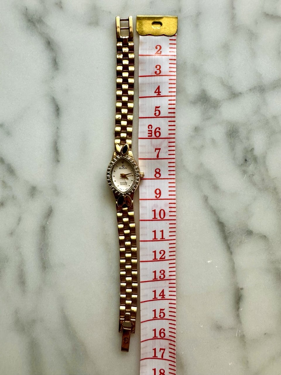 ELGIN "The Heiress" 1990s Diamond-Accented Onyx Marquise Oval Ladies Quartz Gold-tone Watch