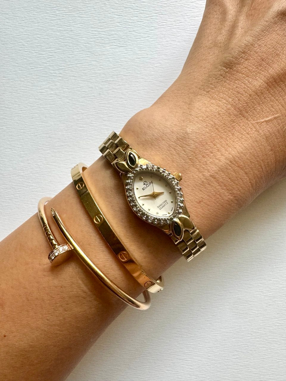 ELGIN "The Heiress" 1990s Diamond-Accented Onyx Marquise Oval Ladies Quartz Gold-tone Watch