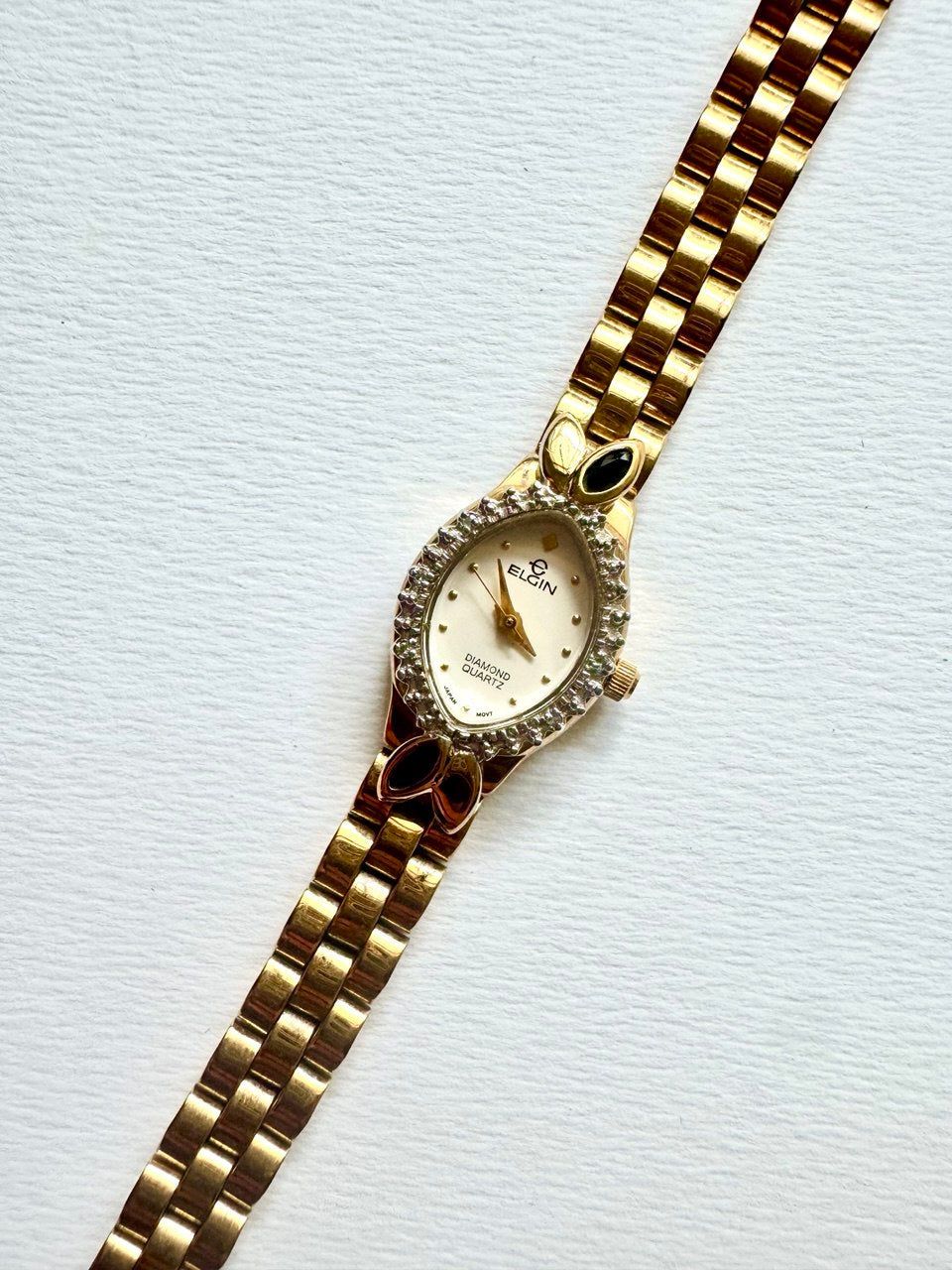 ELGIN "The Heiress" 1990s Diamond-Accented Onyx Marquise Oval Ladies Quartz Gold-tone Watch