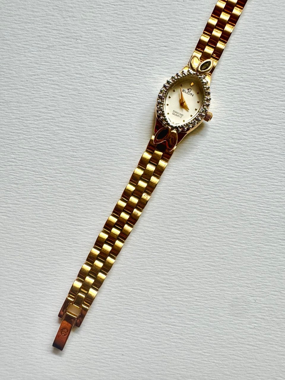 ELGIN "The Heiress" 1990s Diamond-Accented Onyx Marquise Oval Ladies Quartz Gold-tone Watch