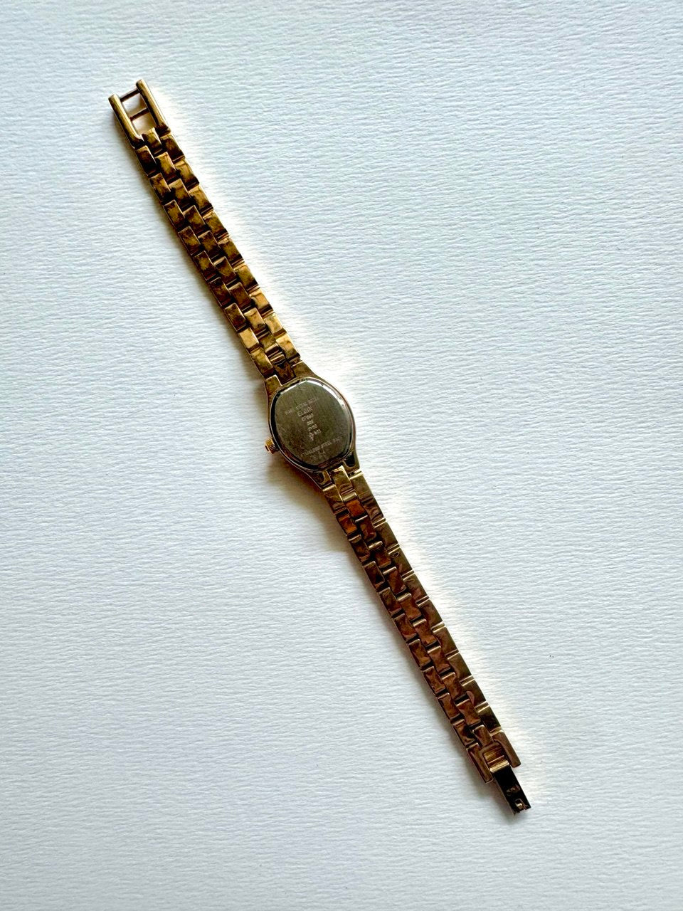 ELGIN "The Heiress" 1990s Diamond-Accented Onyx Marquise Oval Ladies Quartz Gold-tone Watch
