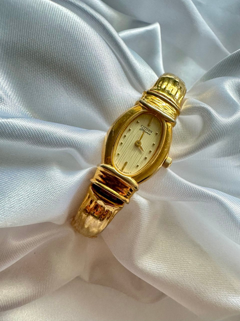 CITIZEN “The Empress” 1990s Gold-Tone Oval Face Quartz Bamboo Bangle Watch