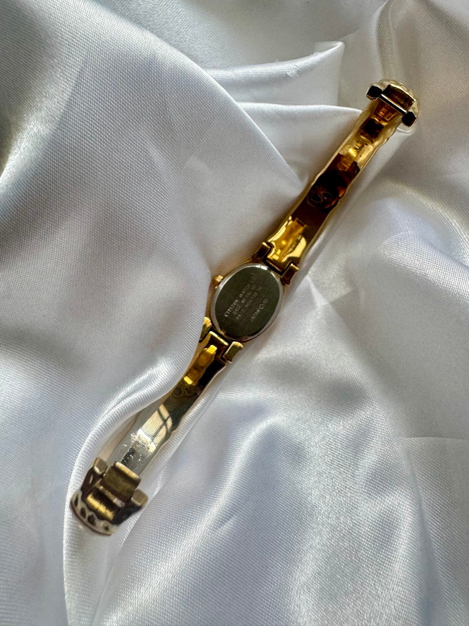 CITIZEN “The Empress” 1990s Gold-Tone Oval Face Quartz Bamboo Bangle Watch