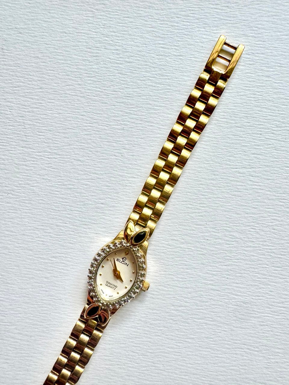 ELGIN "The Heiress" 1990s Diamond-Accented Onyx Marquise Oval Ladies Quartz Gold-tone Watch