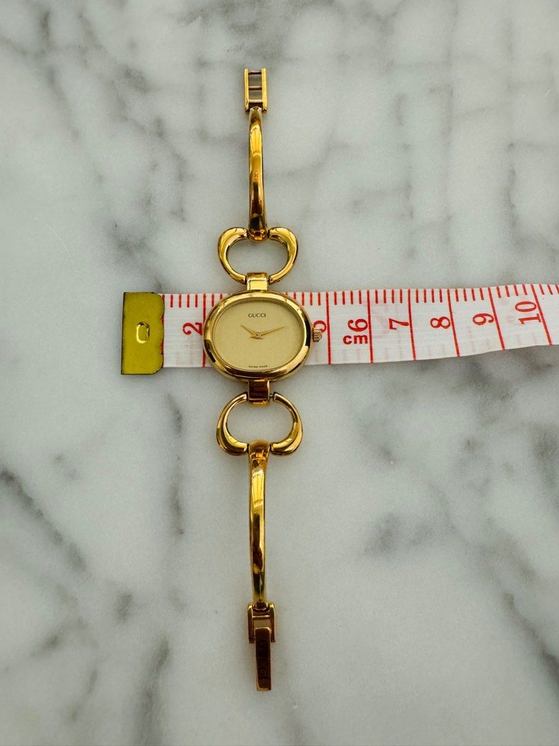 GUCCI Vintage 1990s Quartz Watch with Gold Dial and Semi-Bangle Bracelet