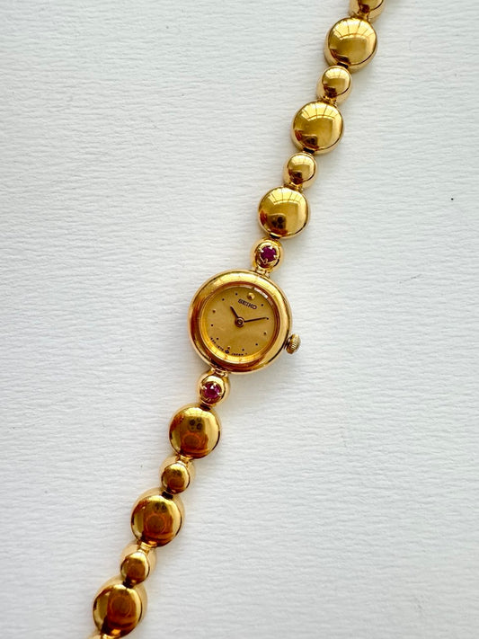 SEIKO Vintage Gold Tone Beaded Bracelet Ruby Studded Quartz Ladies Watch