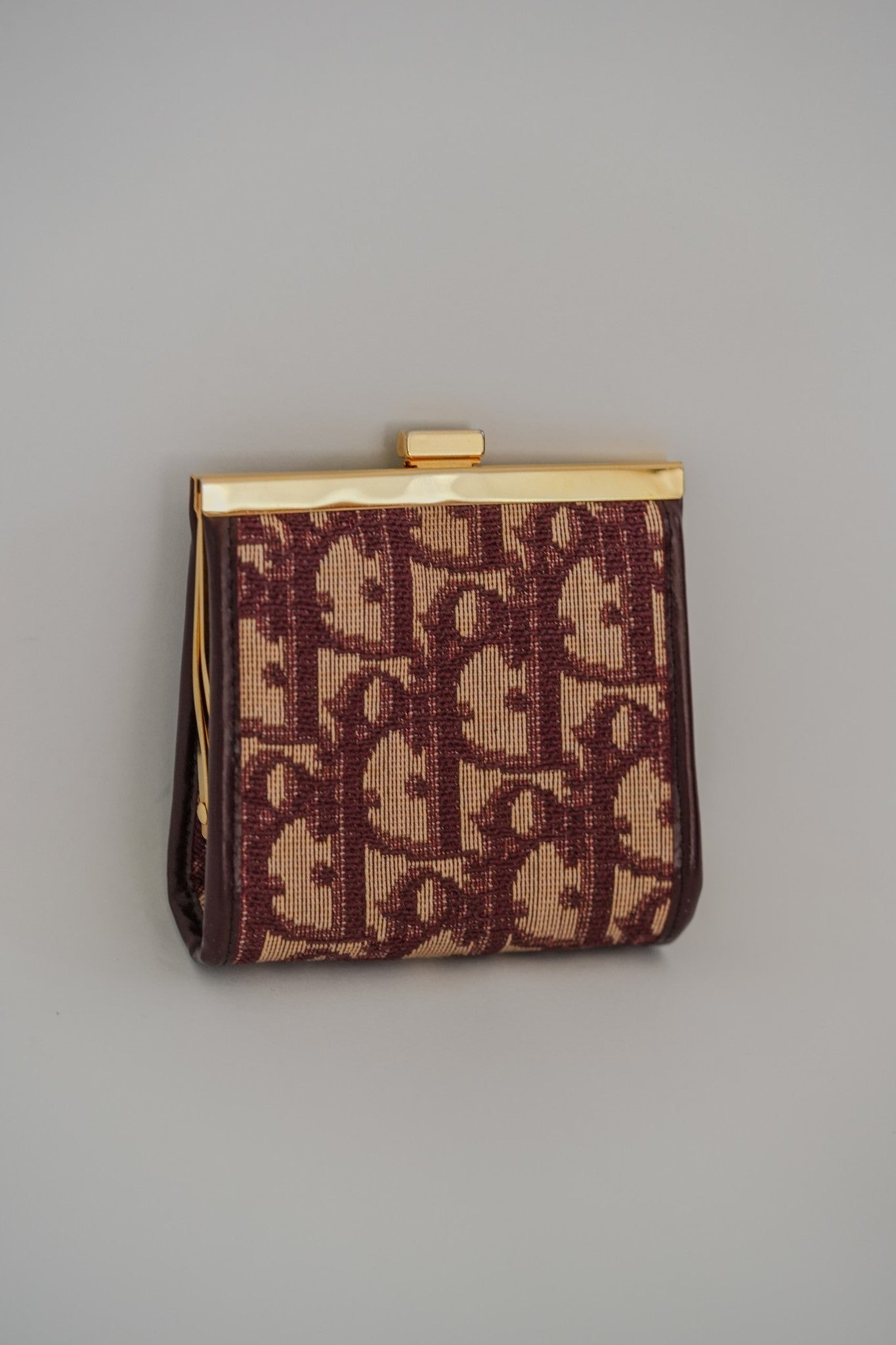 Vintage Christian Dior Trotter Oblique kisslock coin purse in burgundy jacquard canvas, back view