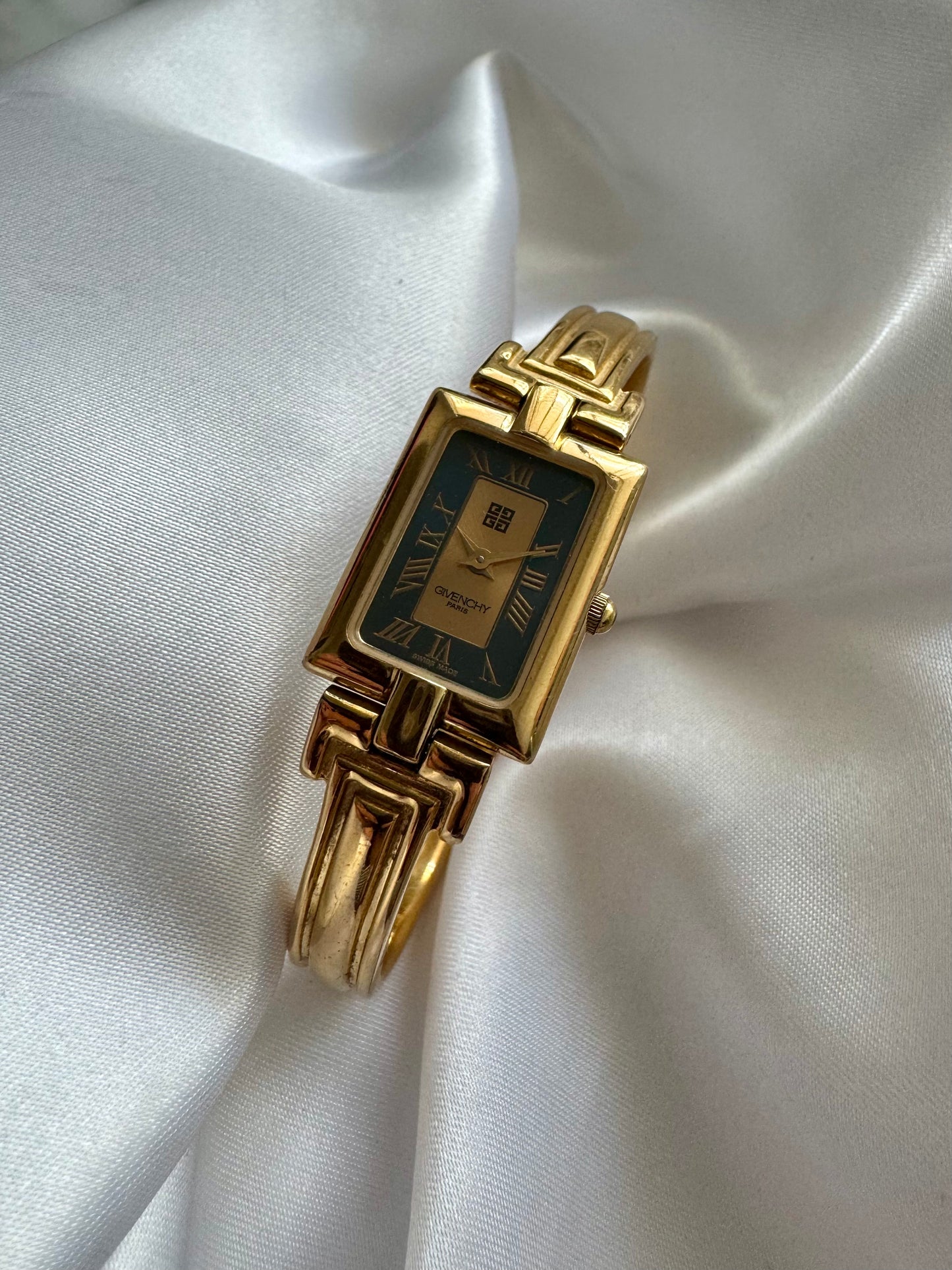 1990s Givenchy Millésime Gold-Plated Bangle Watch with Black Dial