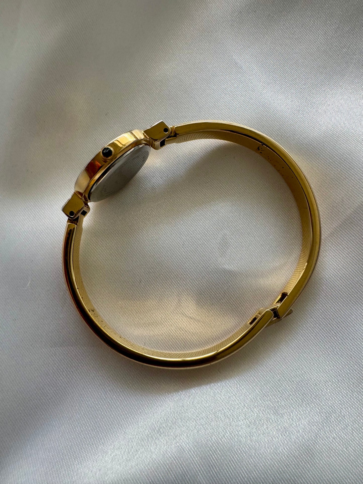 1990s Yves Saint Laurent YSL Gold-Plated Roman Numeral Bangle Watch with Black Dial