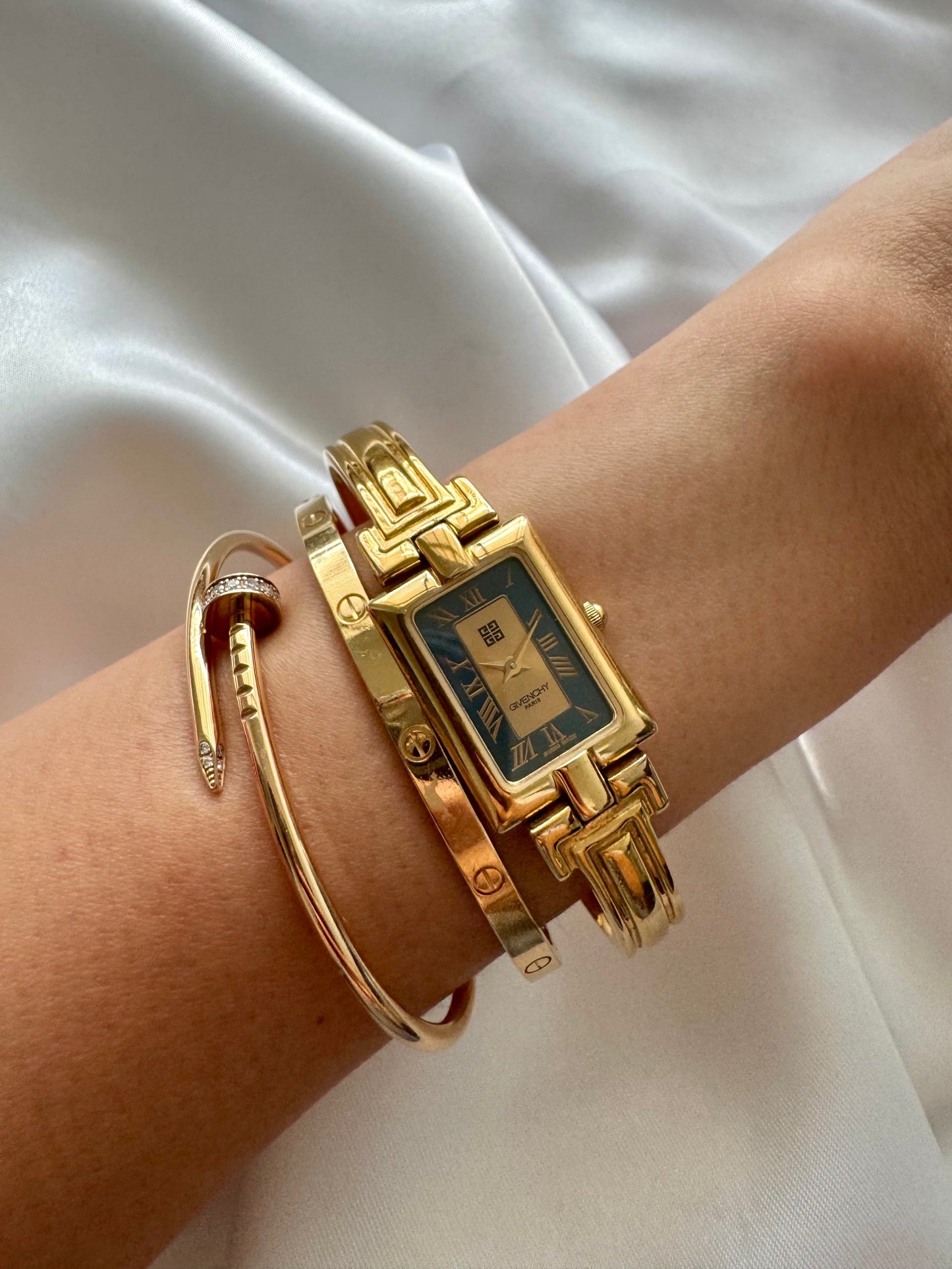 1990s Givenchy Millésime Gold-Plated Bangle Watch with Black Dial