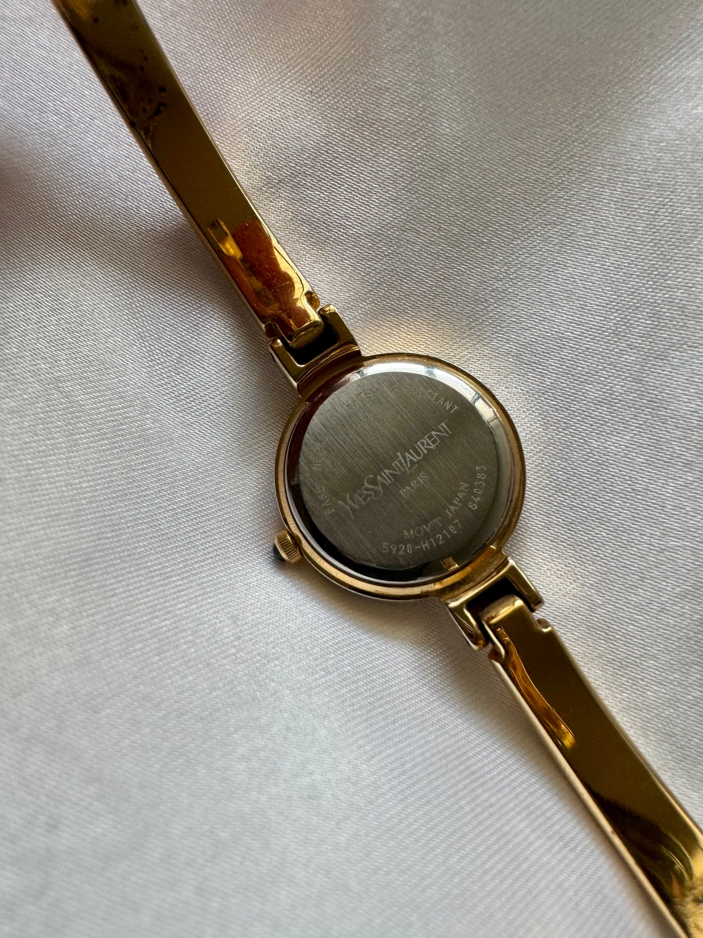 1990s Yves Saint Laurent YSL Gold-Plated Roman Numeral Bangle Watch with Black Dial