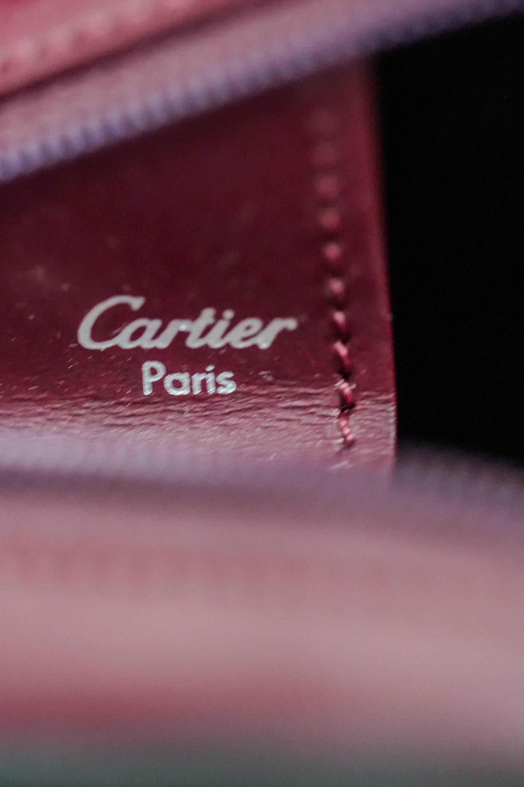 9Cartier Trinity clutch interior burgundy leather lining Cartier Paris silver stamp authentication on the side