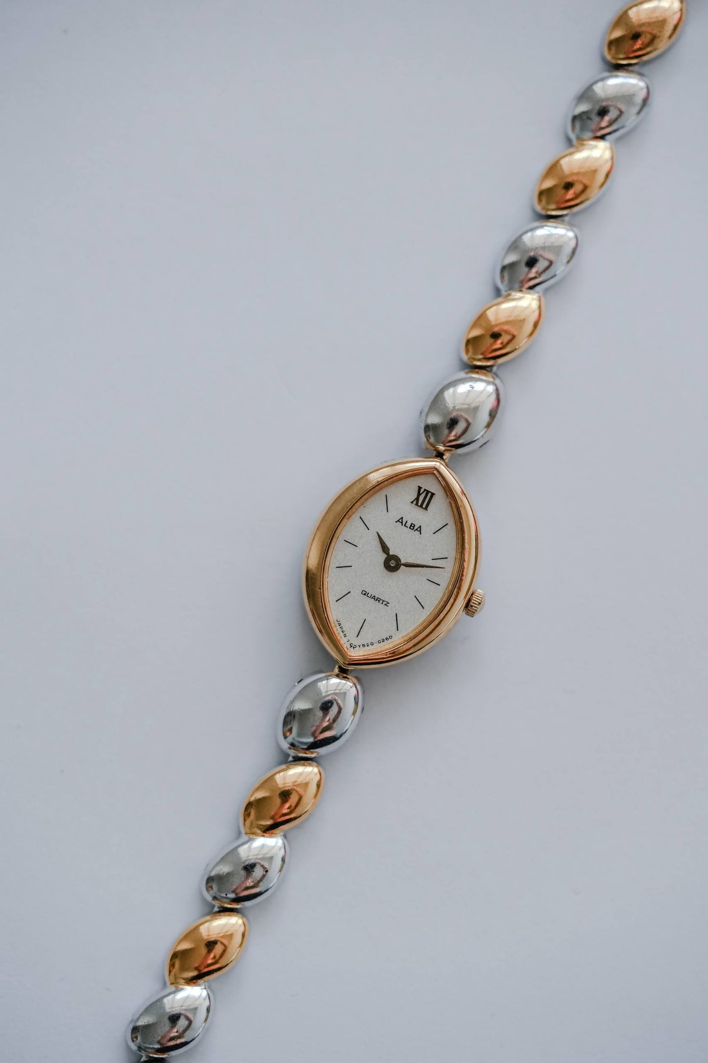 1980s Seiko Alba two-tone pebble link ladies dress watch front view