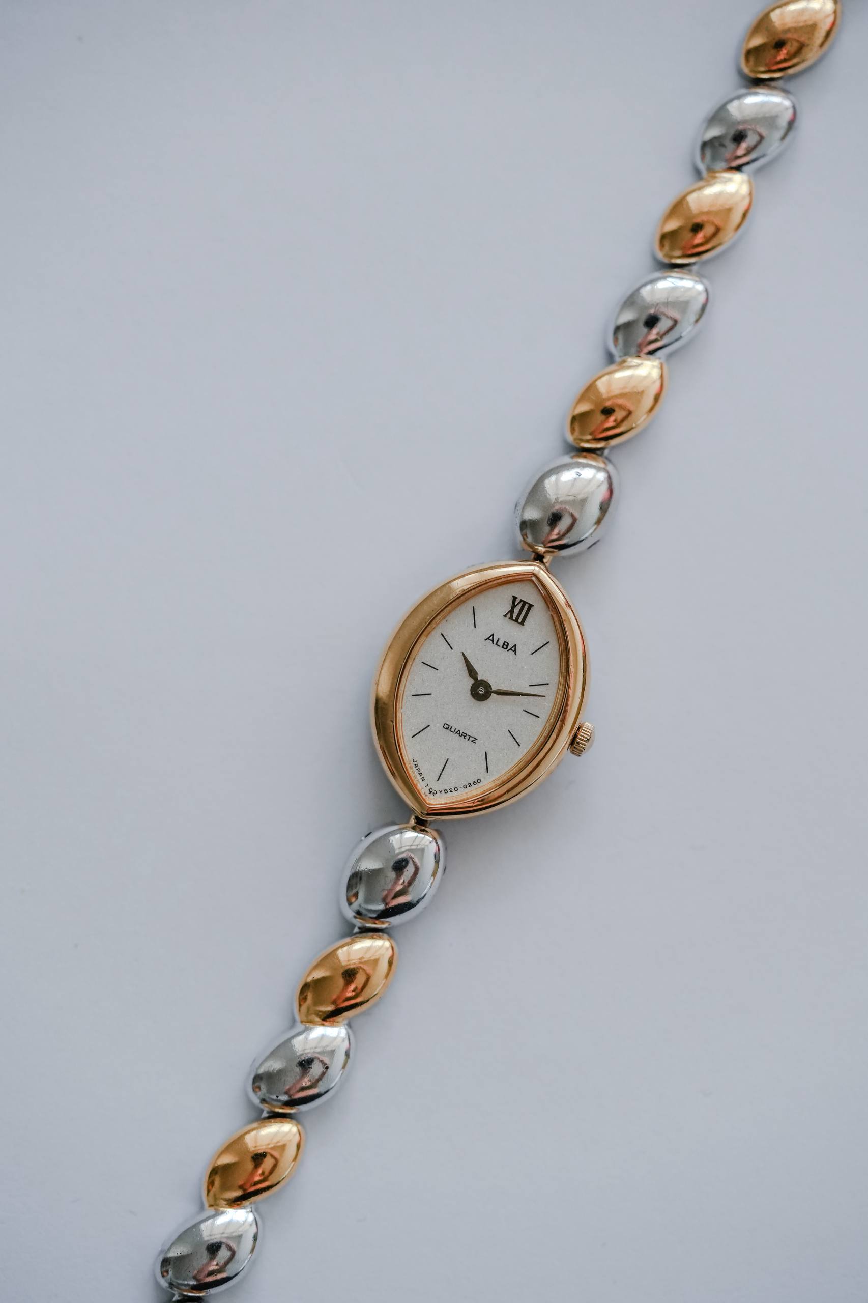 1980s Seiko Alba two-tone pebble link ladies dress watch front view