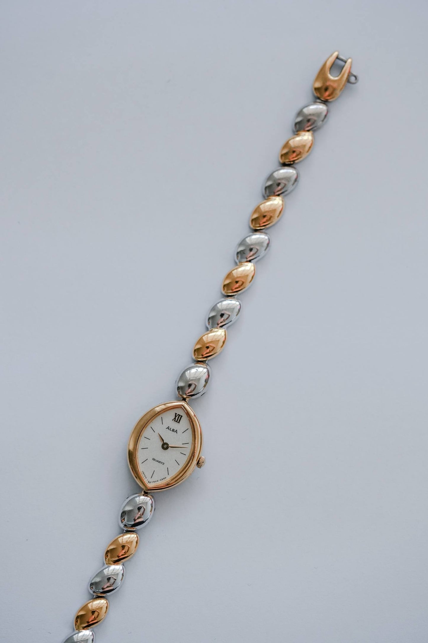 Seiko Alba champagne oval dial close-up Japan quartz