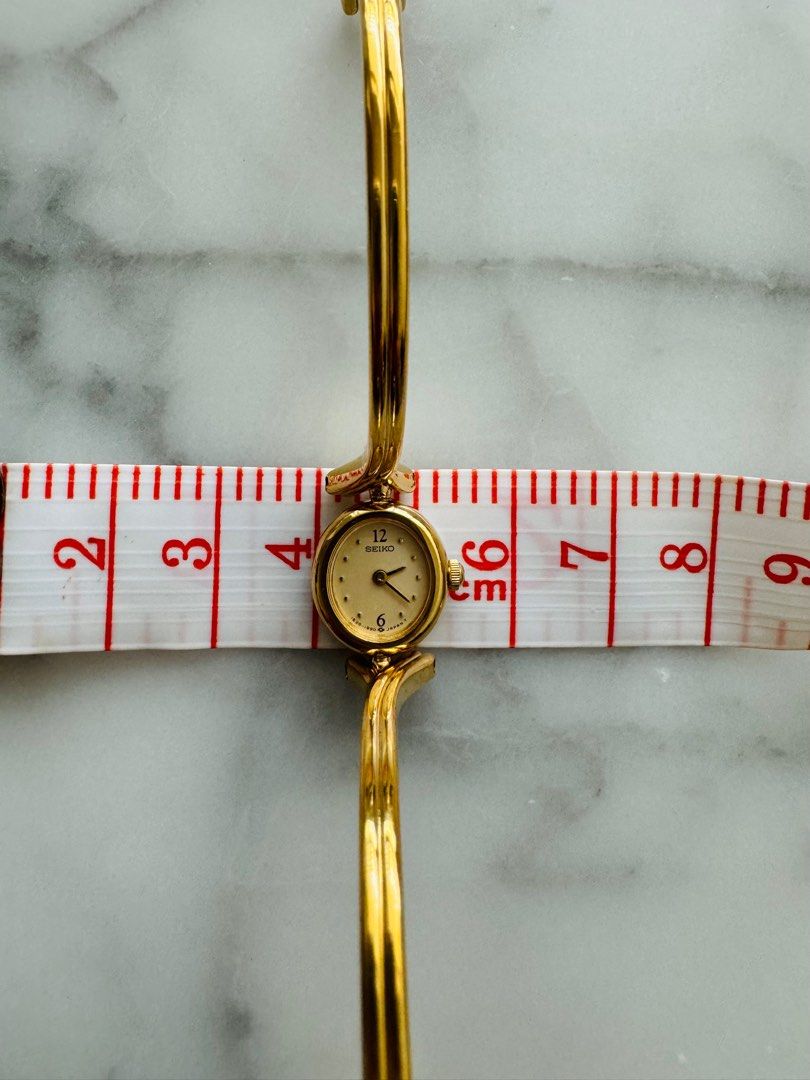 SEIKO Dainty 1990s Gold-Plated Wish Bone Ladies Quartz Watch With Semi Bangle Bracelet