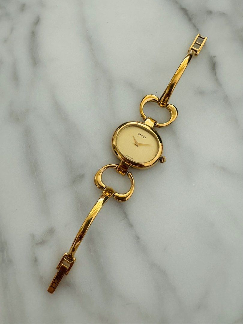 GUCCI Vintage 1990s Quartz Watch with Gold Dial and Semi-Bangle Bracelet