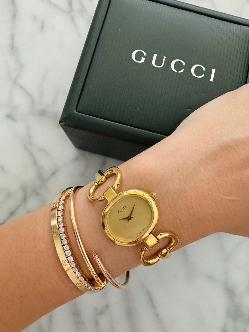 GUCCI Vintage 1990s Quartz Watch with Gold Dial and Semi-Bangle Bracelet