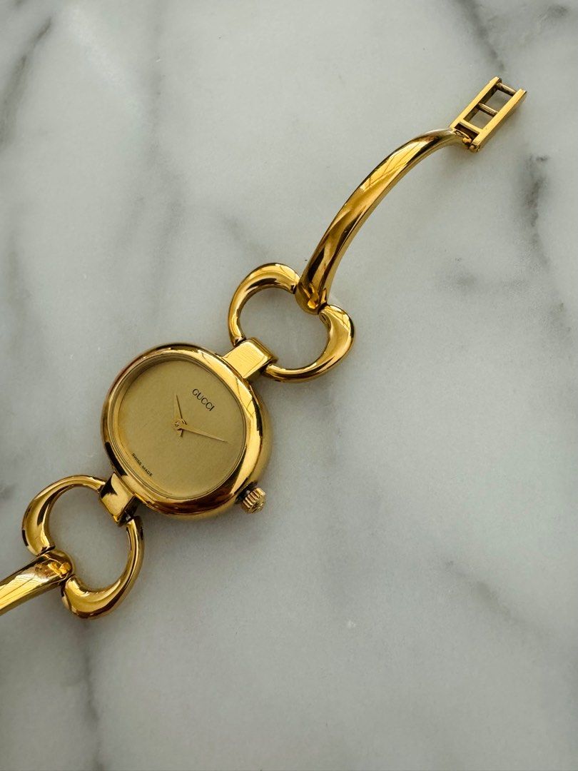 GUCCI Vintage 1990s Quartz Watch with Gold Dial and Semi-Bangle Bracelet