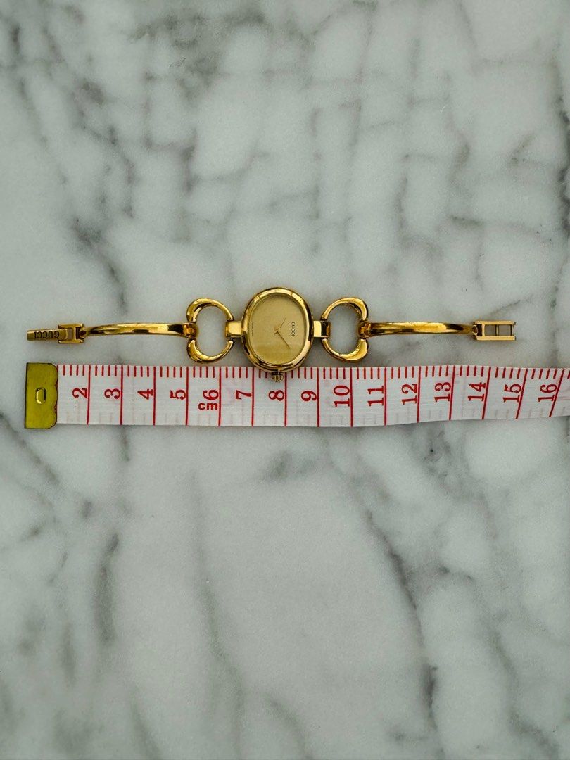 GUCCI Vintage 1990s Quartz Watch with Gold Dial and Semi-Bangle Bracelet