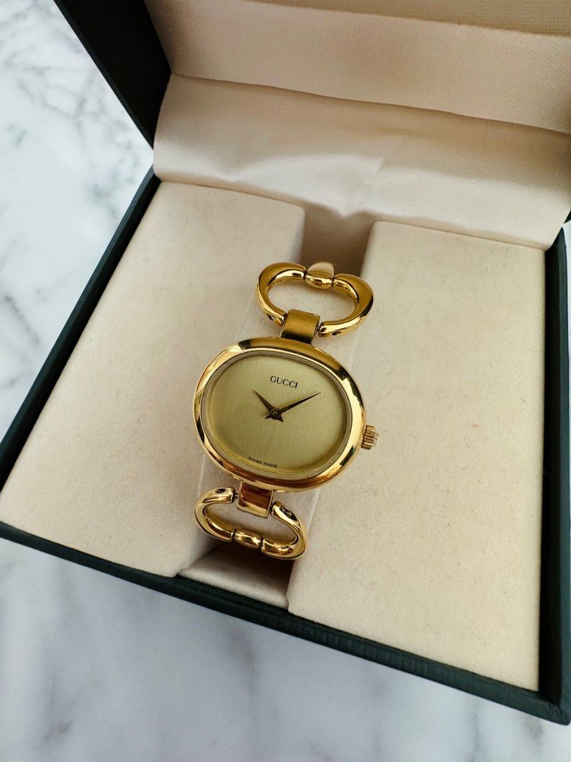 GUCCI Vintage 1990s Quartz Watch with Gold Dial and Semi-Bangle Bracelet