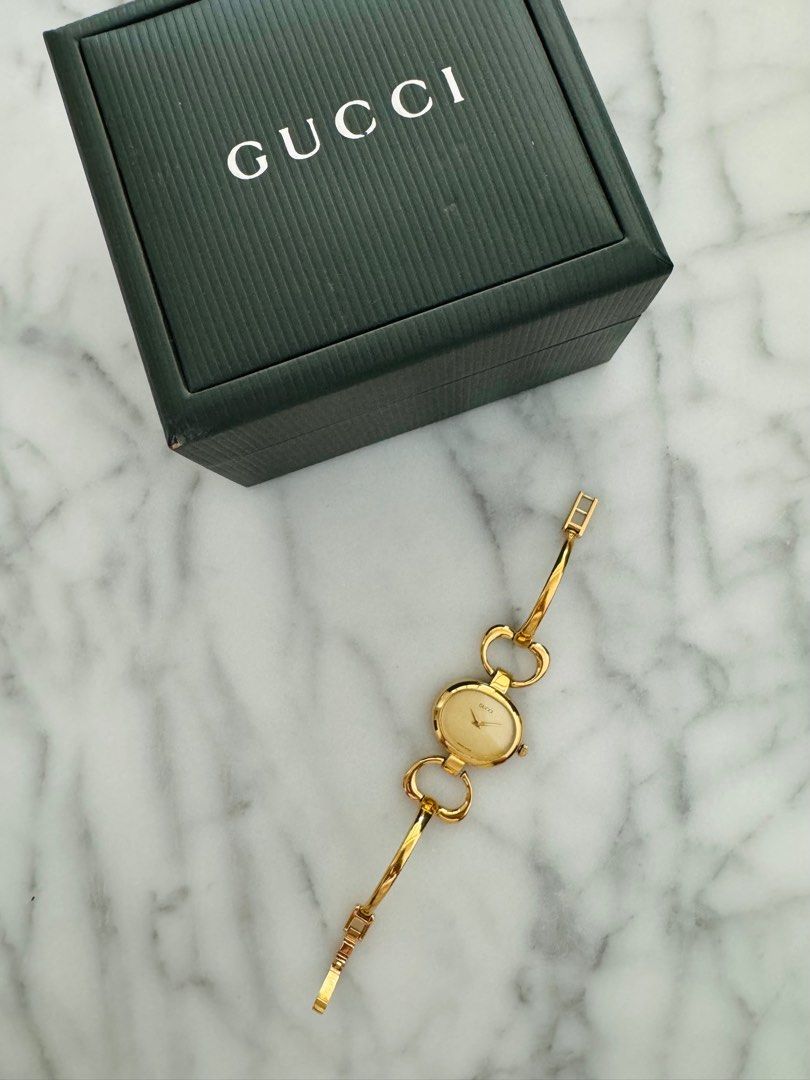 GUCCI Vintage 1990s Quartz Watch with Gold Dial and Semi-Bangle Bracelet